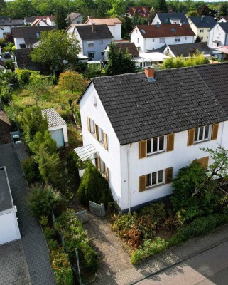 Einfamilienhaus mit großem Grundstück in Sandhausen – Sanierung oder Neubau möglich