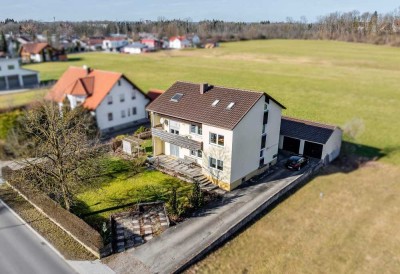 Wohnen im Grünen: Zweifamilienhaus mit großem Garten und viel Potenzial!