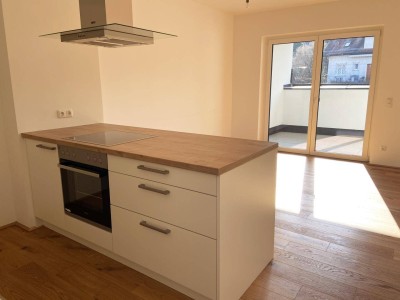 Moderne Dachgeschosswohnung inkl. Einbauküche, Loggia und TG-Platz KOSTENLOS - Top B13