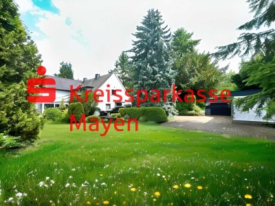 Grünes Wohnparadies mit Parkgrundstück mitten in der Stadt.