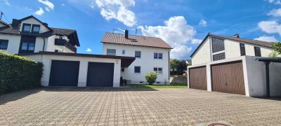 Wohnen mit Stil und Gemeinschaft – modernisierte Wohnung mit Garten & Garage