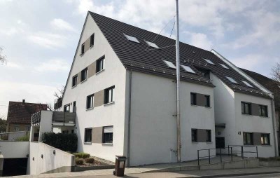 Stilvolle, barrierefreie 2,5-Zimmer-Wohnung mit Balkon, Gartenanteil und Tiefgaragenstellplatz