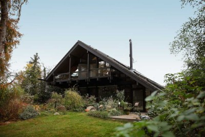 Lichtdurchflutetes 5,5 Zimmer Designhaus mit Gartenparadies