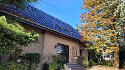 Hochwertige Erdgeschosswohnung mit Garten