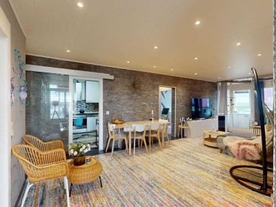 Naturverbundenes Penthouse mit Seeblick