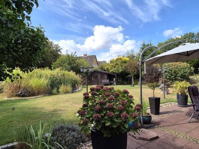 Ein Schmuckstück für Sie! Stilvolles und gepflegtes Einfamilienhaus mit einem Garten zum Träumen