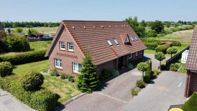 Großzügiges Einfamilienhaus auf traumhaftem Grundstück in Wiesmoor – direkt am Kanal!