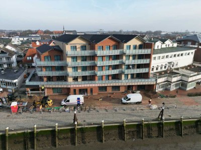 Büsum/Hafen – Nr. 6: Stilvolle Neubauwohnung mit 3 Zimmern, offener Wohnküche & Balkon