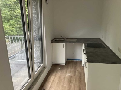 Geschmackvolle Wohnung mit zwei Zimmern sowie Dachterrasse und Einbauküche in Hamburg