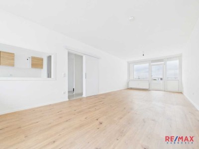 Modernisierte 4-Zimmer-Wohnung mit 2 Balkonen, TG-Stellplatz uvm.