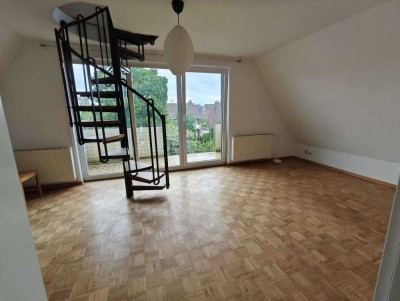 Gemütliche 2-Zimmer-DG-Wohnung mit Balkon und Einbauküche in Meerbusch-Büderich