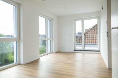 Moderne 2-Zimmerwohnung mit EBK und großer Dachterrasse in zentraler Lage