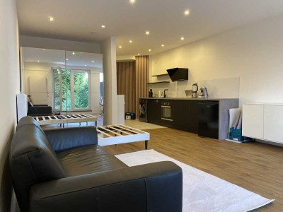 Exklusive möblierte 1-Raum-Erstbezug-Souterrain-Wohnung mit gehobener Innenausstattung & Terrasse