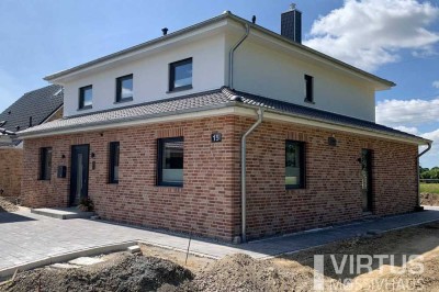 Aumühle: Komfortabler Neubau auf herrlichem Süd-Grundstück