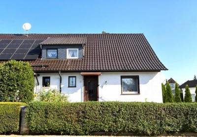 Charmante Doppelhaushälfte mit Gartenidylle