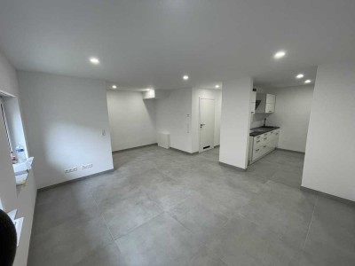 Neubau – Erstbezug! Attraktive 3-Zimmer-Souterrain-Wohnung mit EBK und Möbel in Rastatt/Wintersdorf