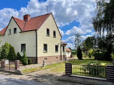 Charmante Doppelhaushälfte mit großem Garten in gefragter Lage