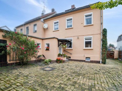 Charmante Doppelhaushälfte mit Ausbaupotential und Gartenidylle in Leipzig