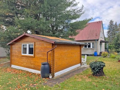 Brandis sofort frei - Gemütliches Wohnhaus, 2 Garagen, großes Gartenhaus, ringsum eingefriedet.