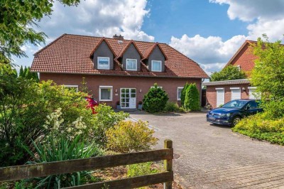 Erdgeschosswohnung mit großem Garten, Terrasse & guter Ausstattung in Meinersen-Feldrandlage!