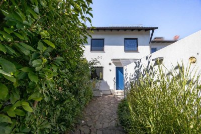 Modernes Reihenhaus mit Sauna &  großem Garten in München