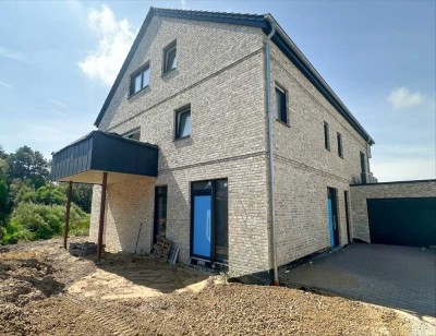 Erstbezug in luxuriöse 3-Zimmer-Maisonettewohnung mit Balkon und Blick ins Grüne!