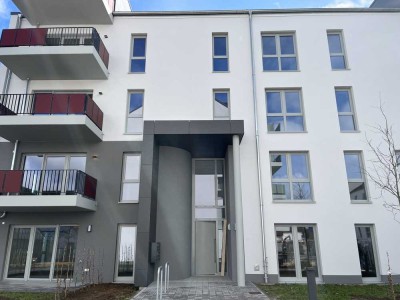 Lichtdurchflutete Erdgeschosswohnung mit EBK, Sonnenterrasse und kleinem Gartenanteil