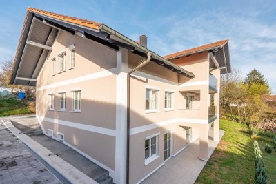 Hochwertig sanierte Wohnung mit moderner EBK, Süd-Terrasse und kleinem Garten