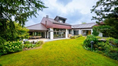 Architektur trifft Lebensqualität! Bungalow-Rarität mit Wellnessbereich und Gartenidylle