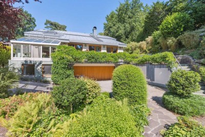 Exklusives Architektenhaus – Wohnen auf höchstem Niveau mit traumhaftem Gartenparadies