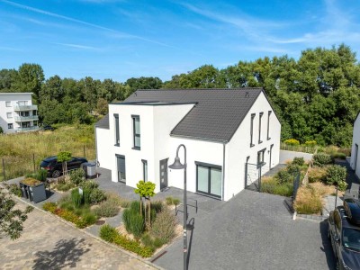 Scharbeutz - strandnahe neuwertige großzügige 4-Zimmer-Wohnung mit großer Terrasse