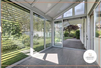 **Familienfreundliche Erdgeschosswohnung mit Wintergarten, Großem Gartenanteil & 2 TG-Stellplätzen**