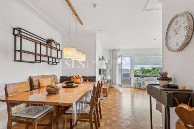 Lichtdurchflutete Dachgeschosswohnung mit Balkon und Garage in gepflegtem Haus