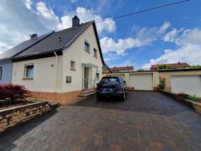 Gemütliche Immobilie mit Garten und 2 Garagen in ruhige Lage 66539 Neunkirchen/Furpach