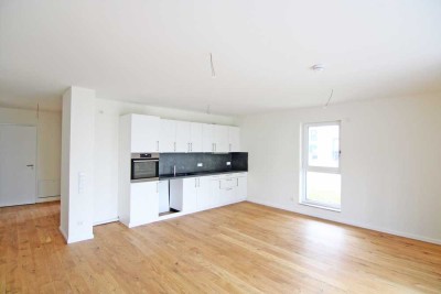 Terrassenwohnung mit besonders schönem Grundriss - mitten im Grünen, im Erstbezug!