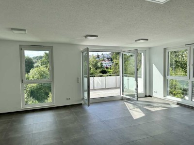 Neubau 3,5 Zimmer-Wohnung mit Balkon, einer Einbauküche, Einbauleuchten und Fußbodenheizung