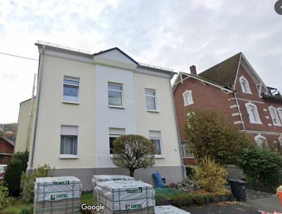 Zentrale Dachgeschosswohnung 3 ZKB incl. Einbauküche und großem Garten