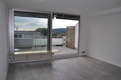 2-Zimmer Dachgeschosswohnung mit Dachterrasse in Waldrandlage