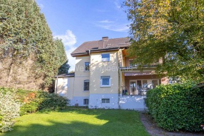Großzügiges, modernisiertes Wohnhaus mit 2 Einheiten / 2 Loggien + Garten / 2 Garagen + Stellplätze