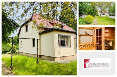 Schöneiche - Einfamilienhaus auf großem Grundstück - Keller, Nebengelass, Garagen, Sauna!