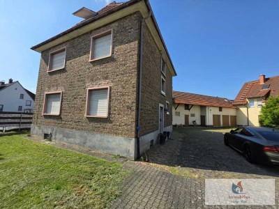 Verkauf - Hofreite mit Zweifamilienhaus, Doppelhaus, Garagen und Nebengebäude in Hanau Klein-Auheim
