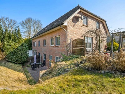 Charmante Doppelhaushälfte mit Einliegerwohnung in familienfreundlicher Lage von Quickborn