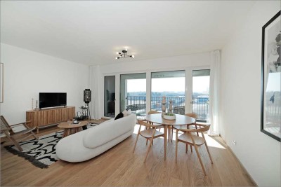 Neubau: 3 Zimmer mit Südbalkon, Blick & moderner Einbauküche – ruhig & sonnig