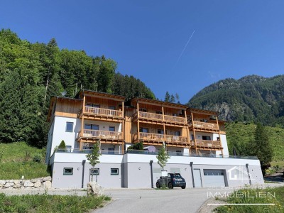 NEUBAUWOHNUNG AUF EINER KLEINEN ANHÖHE MIT AUSBLICK