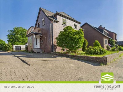 REIMANN&WOLFF Waldfeucht-Haaren: "Charme trifft Freiraum - Ihr Zuhause mit Grün."