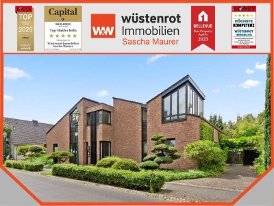 Hochwertiges, flexibel nutzbares Architektenhaus mit Einliegerwohnung und Traumgarten in begehrter L