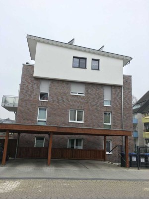 Moderne 2-Zimmer-Penthouse-Wohnung mit Balkon und Carport in zentraler Lage von Langenfeld