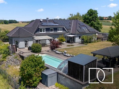 5.176m² Grundstücksfläche! Energieeffiziente Luxusvilla mit Pool in ruhiger Lage