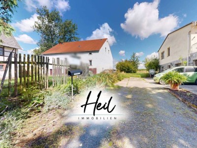 Vielseitiger Dreiseitenhof – Wohnhaus mit großer Terrasse, Fachwerkscheune & weitläufigem Grundstück