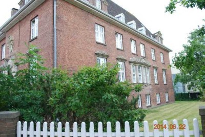Kleine zentrale 1,5-Zimmerwohnung in repräsentativem, denkmalgeschützten Backsteingebäude